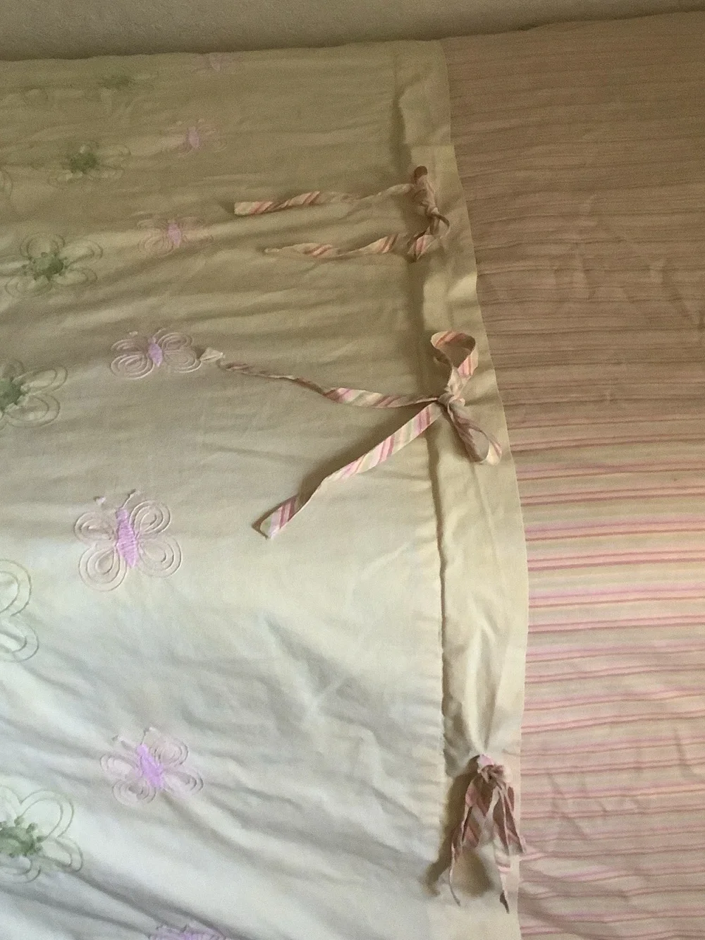 Cream Floral Embroidered Quilt with Peach Accents
